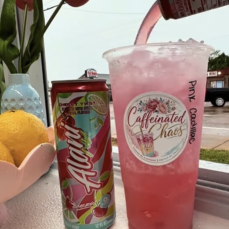 A pink loaded tea and energy drink